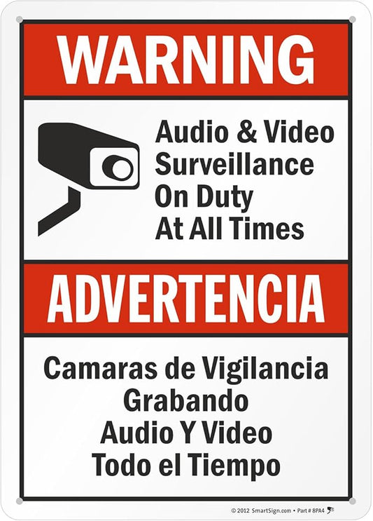 SmartSign-S-9392-AL-14 Warning - Audio & Video Surveillance On Duty At All Times Bilingual Sign By | 10" x 14" Aluminum - Black/Red on White