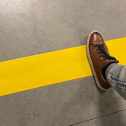 SmartSign Yellow 4 inch x 100 feet Floor Marking Tape, 32 mil Vinyl Floor Tape, Superior Mark Industrial Use Safety Tape with Beveled Edges, Strong Adhesive, for Gym/Warehouse/Courts