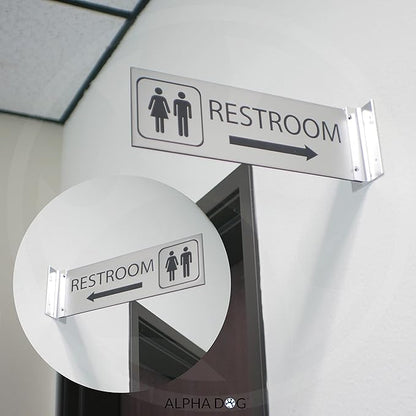 ALPHA DOG SIGNS Corridor Projecting Hallway Bathroom Sign, Left Arrow, 4"x12" Double Sided, Indoor/Outdoor, Easy Install, Durable Business Wayfinding Plaque, USA-Made (Brushed Stainless)