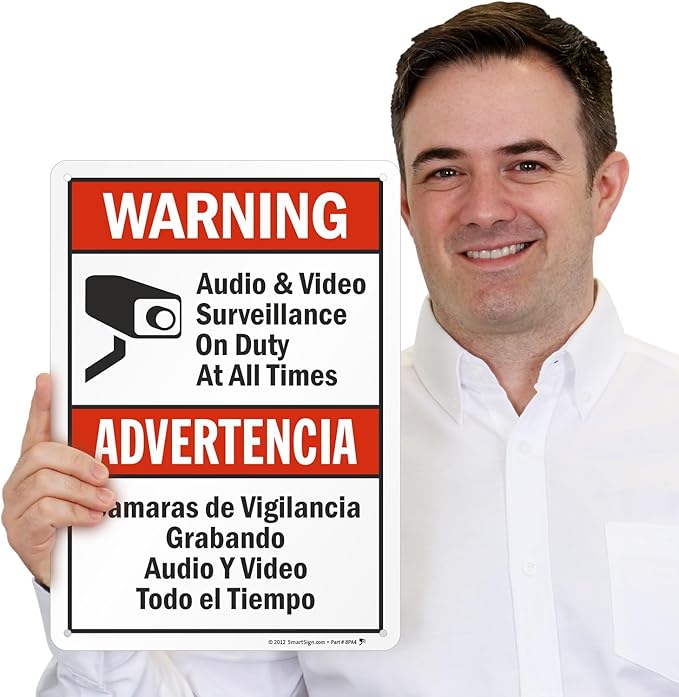 SmartSign-S-9392-AL-14 Warning - Audio & Video Surveillance On Duty At All Times Bilingual Sign By | 10" x 14" Aluminum - Black/Red on White