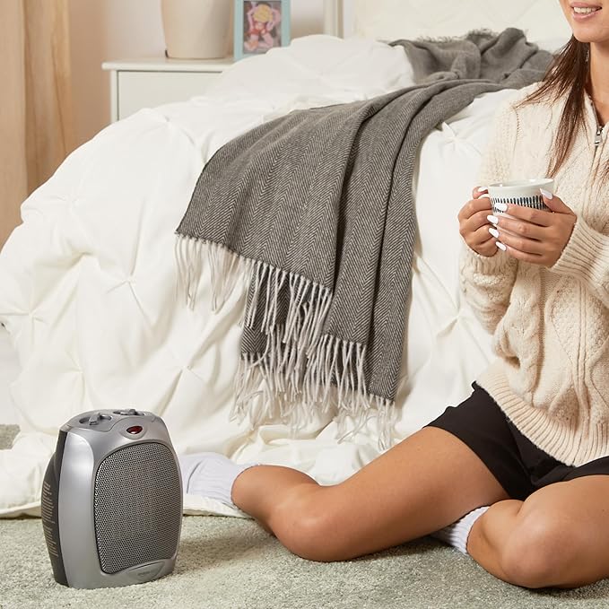 Amazon Basics Ceramic Space Heater, Portable Indoor Heating Solution, With Overheat and Tip-Over Protection, Thermostat, Non-Oscillating, 1500W, 7.52"D x 6.34"W x 9.45"H, Silver